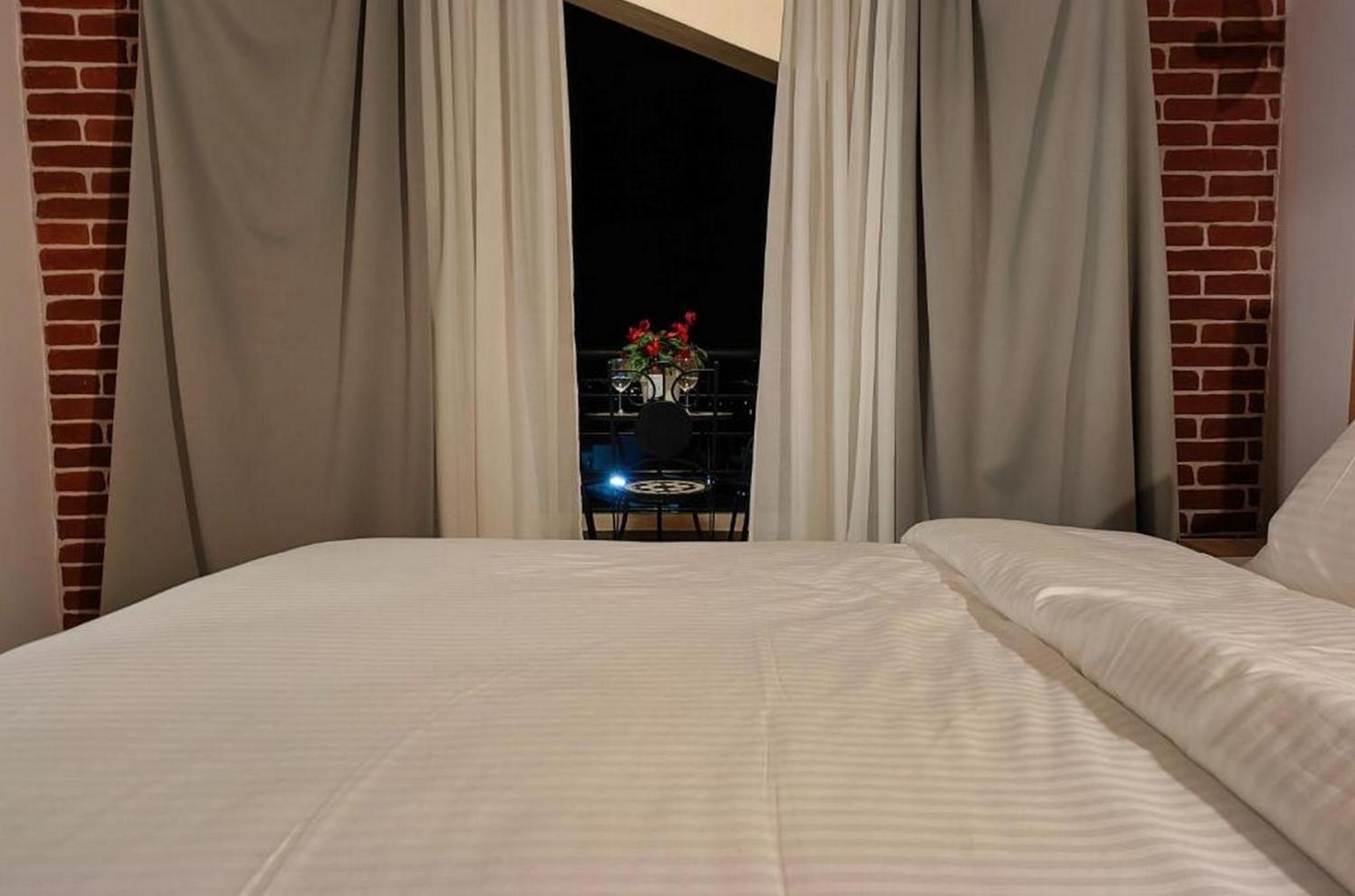 كالامباكا Centro Urban Suites الغرفة الصورة